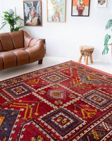  Vintage Turkish rug in a living room setting, pile rug, Turkish rug, vintage rug, portland, rug shop, bright colors, wild shaman, soft rug, bold color, Portland, Oregon, rug store, rug shop, local shop
