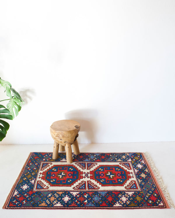 Vintage mini kilim rug in room decor setting, kilim, Turkish rug, vintage rug, portland, rug shop, bright colors, wild shaman, soft rug, bold color, Portland, Oregon, rug store, rug shop, local shop