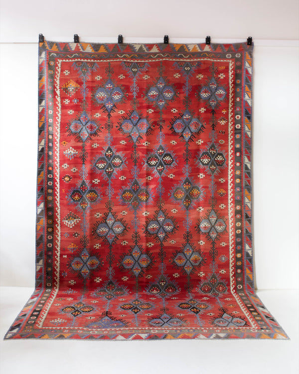 Vintage kilim rug in room decor setting, kilim, Turkish rug, vintage rug, portland, rug shop, bright colors, wild shaman, bold color, Portland, Oregon, rug store, rug shop, local shop, antique rug