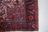 Antique Persian area rug in a living room setting, pile rug, vintage rug, portland, rug shop, bright colors, wild shaman, soft rug, bold color, Portland, Oregon, rug store, rug shop, local shop, antique rug, Persian rug, handmade rug, wool rug