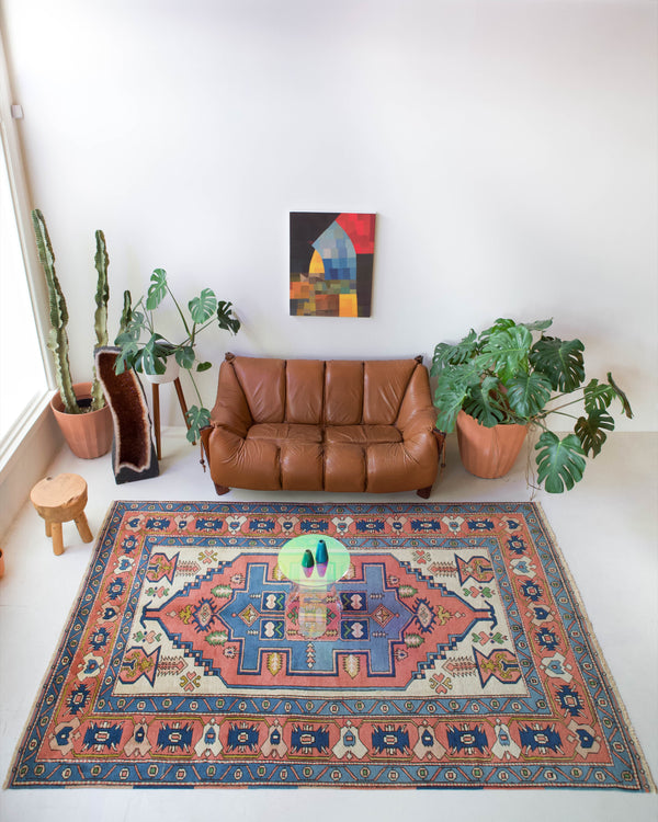 Vintage caucasian rug in a living room setting, pile rug, Turkish rug, vintage rug, portland, rug shop, bright colors, wild shaman, soft rug, bold color, Portland, Oregon, rug store, rug shop, local shop, soft rug, pastel colors, faded colors