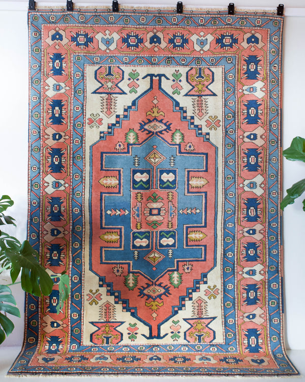 Vintage caucasian rug in a living room setting, pile rug, Turkish rug, vintage rug, portland, rug shop, bright colors, wild shaman, soft rug, bold color, Portland, Oregon, rug store, rug shop, local shop, soft rug, pastel colors, faded colors