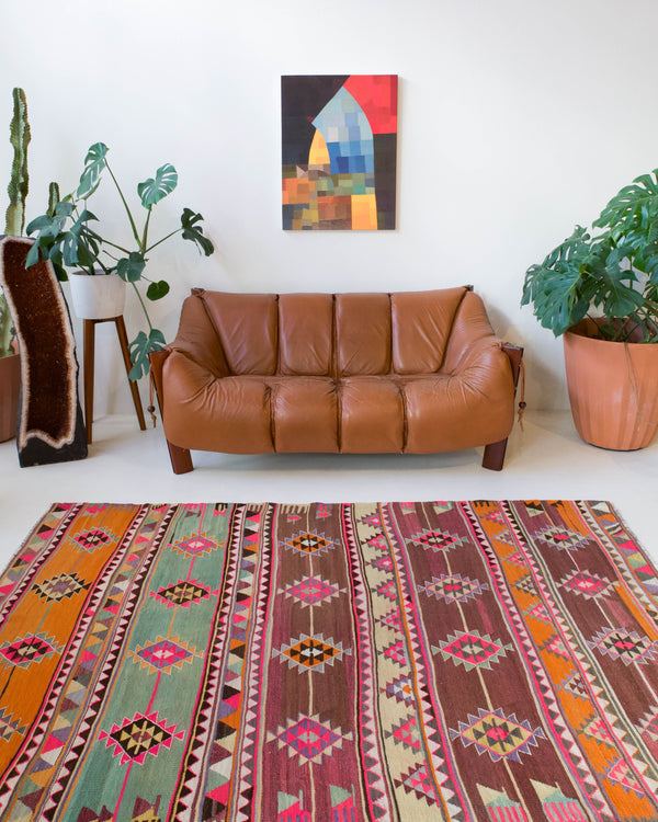 Vintage kilim rug in living room setting, bright colors, wild shaman, soft rug, bold color, Portland, Oregon, rug store, rug shop, local shop