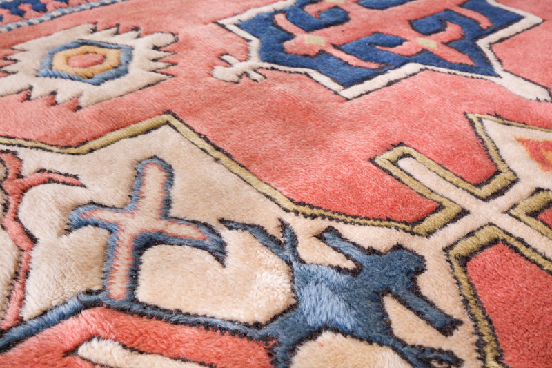 Vintage caucasian rug in a living room setting, pile rug, Turkish rug, vintage rug, portland, rug shop, bright colors, wild shaman, soft rug, bold color, Portland, Oregon, rug store, rug shop, local shop, soft rug, pastel colors, faded colors