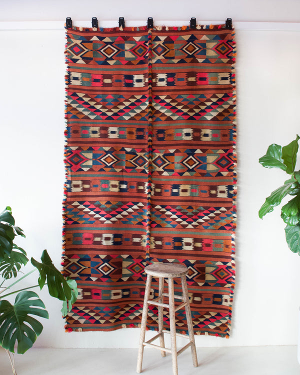 Vintage kilim rug in living room setting, bright colors, wild shaman, soft rug, bold color, Portland, Oregon, rug store, rug shop, local shop, vintage rug, modern kilim