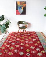 Vintage kilim rug in living room setting, bright colors, wild shaman, soft rug, bold color, Portland, Oregon, rug store, rug shop, local shop, vintage rug, modern kilim