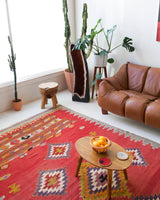 Vintage kilim rug in living room setting, bright colors, wild shaman, soft rug, bold color, Portland, Oregon, rug store, rug shop, local shop, vintage rug, modern kilim