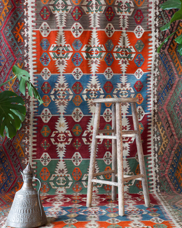 Antique kilim rug in living room setting, bright colors, wild shaman, soft rug, bold color, Portland, Oregon, rug store, rug shop, local shop, vintage rug, modern kilim, antique kilim, antique