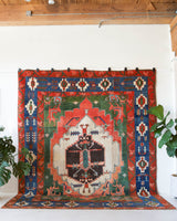 Vintage Turkish rug in a living room setting, pile rug, Turkish rug, vintage rug, portland, rug shop, bright colors, wild shaman, soft rug, bold color, Portland, Oregon, rug store, rug shop, local shop