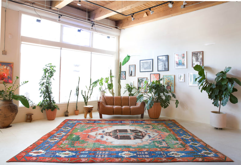 Vintage Turkish rug in a living room setting, pile rug, Turkish rug, vintage rug, portland, rug shop, bright colors, wild shaman, soft rug, bold color, Portland, Oregon, rug store, rug shop, local shop