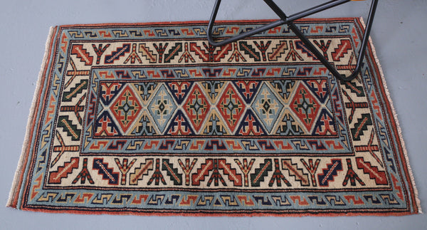 old rug, antique rug, earthy colors, faded colors, turkish rug, vintage rug, flat weave, mini rug, pile rug, Wild Shaman, Portland, Oregon, rug store, rug shop, local shop, kilim rug