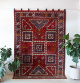 Vintage Turkish rug in a living room setting, pile rug, Turkish rug, vintage rug, portland, rug shop, bright colors, wild shaman, soft rug, bold color, Portland, Oregon, rug store, rug shop, local shop, antique rug