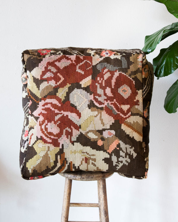 Floor pouf in a living room setting, pillow, turkish pillow, kilim pillow, home decor, decorative pillow, sham, rug pillow, decor, home decor, pouf, floor cushion, cushion, Portland, rugshop, Oregon, Wild Shaman, ottoman