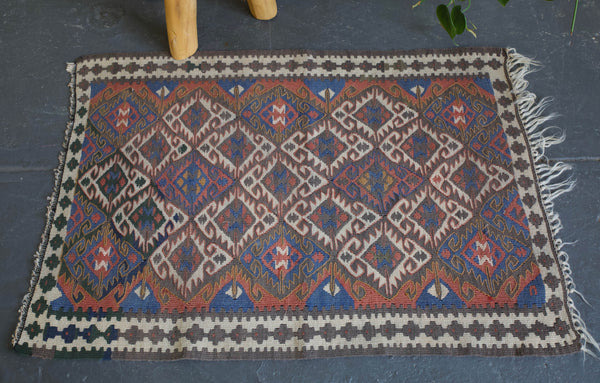 old rug, antique rug, earthy colors, faded colors, turkish rug, vintage rug, flat weave, mini rug, pile rug, Wild Shaman, Portland, Oregon, rug store, rug shop, local shop, kilim rug